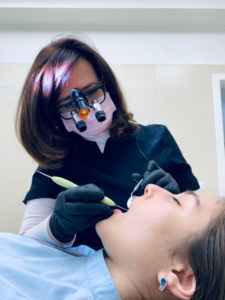 Cosmetic dentist at work