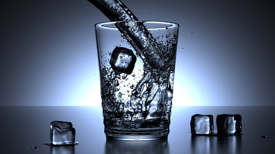 A glass with ice cold water. 