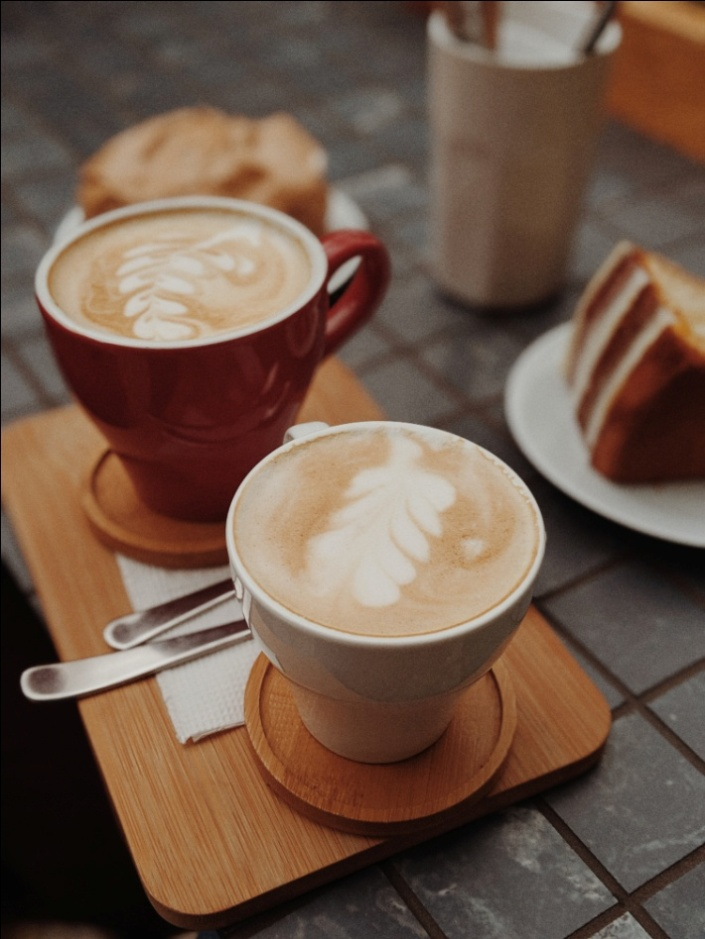 Two sugary coffee drinks on a table