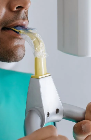 An individual undergoing a dental checkup