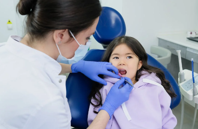 A dental care specialist treats a patient in West Hills, California