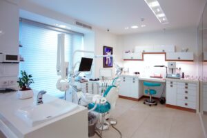 A dental clinic with multiple machines and dental equipment