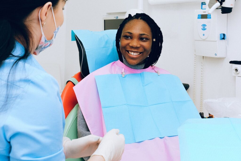 Happy Woman Having a Dental Checkup