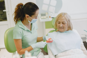 An elderly at a dental clinic
