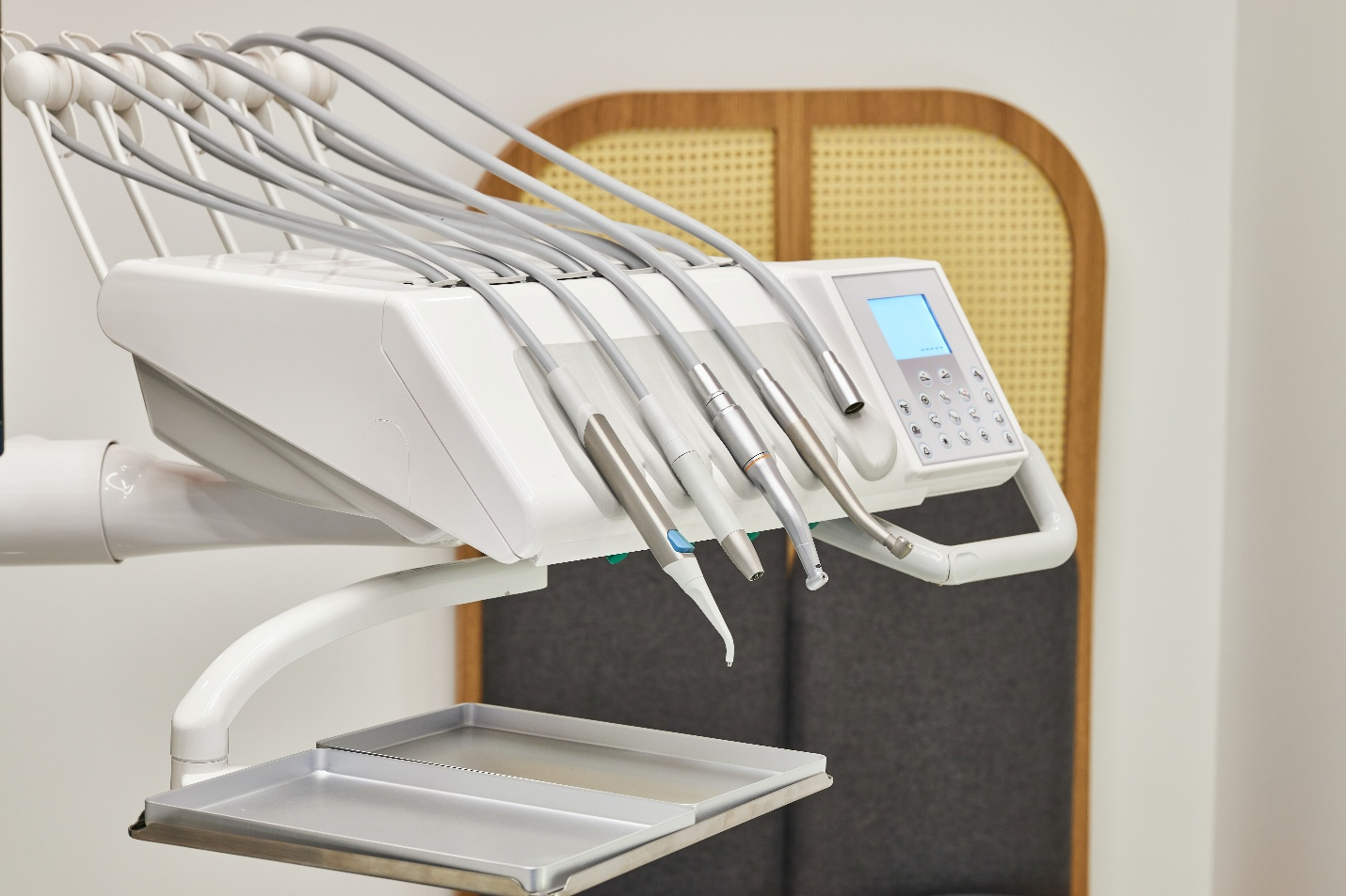 Dental equipment placed on a stand.