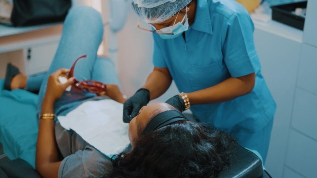 A dentist performing a dental procedure