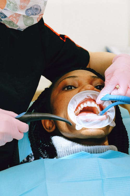 A woman having a dental cleaning